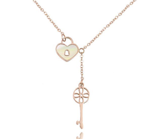 599/1116 Naszyjnik stalowy serce z masą perłową i klucz