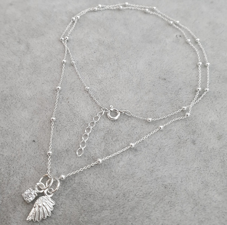 1314 naszyjnik srebrny 925 z cyrkonią i skrzydełkiem