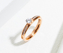 599/965 pierścionek z cyrkoniami stal różowe złoto