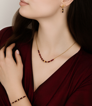 Elegancki burgundowy komplet złocony z granatem 1875/3