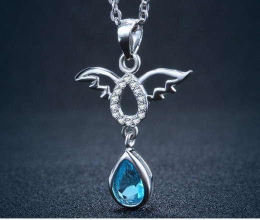 1064/3 wisiorek srebrny aniołek rodowany błękitna cyrkonia