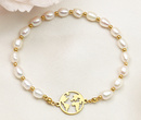 bransoletka pozłacana 1748 z globusem, perły naturalne 