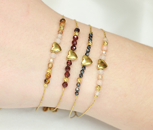 Złota bransoletka z granatem 1772/2