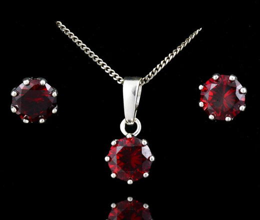 480/83 komplet srebrny okrągłe z bordowymi cyrkoniami