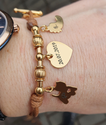 1254 bransoletka grawerowana srebrna pozłacana na sznurku trzy zawieszki