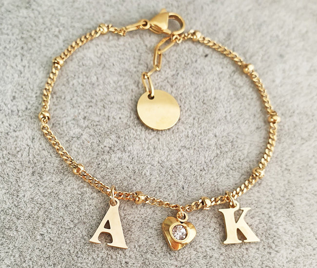 1232/23 bransoletka złota stalowa z inicjałami i sercem