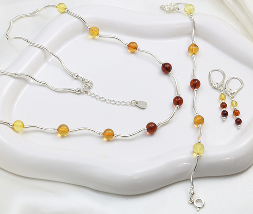 Elegancki bursztynowy komplet złocony 1875/11