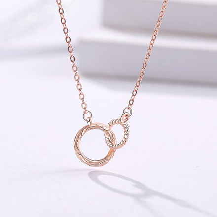 1064/8 Naszyjnik różowe złoto połączone kółeczka