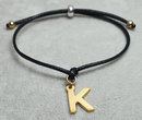 1116 bransoletka z dowolną literką, złota na sznureczku s. 925