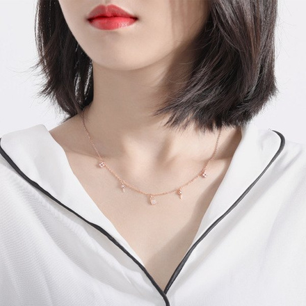 1064/14 Naszyjnik żółte złoto z kłódką, koniczynką kluczykiem delikatny