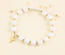 1571/13 bransoletka różaniec złota na sznureczku z porcelanowymi koralikami i krzyżem