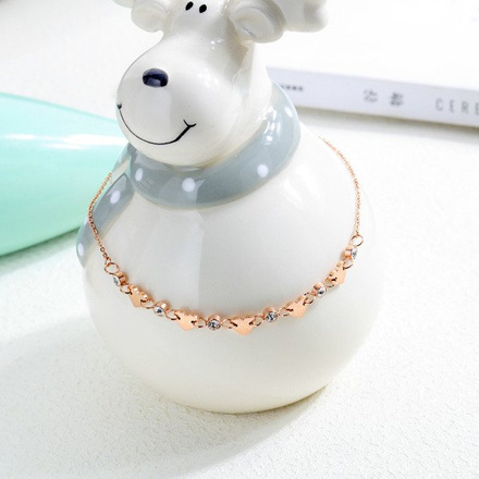 599/947 BRANSOLETKA stalowa złota na nogę serduszka i cyrkonie