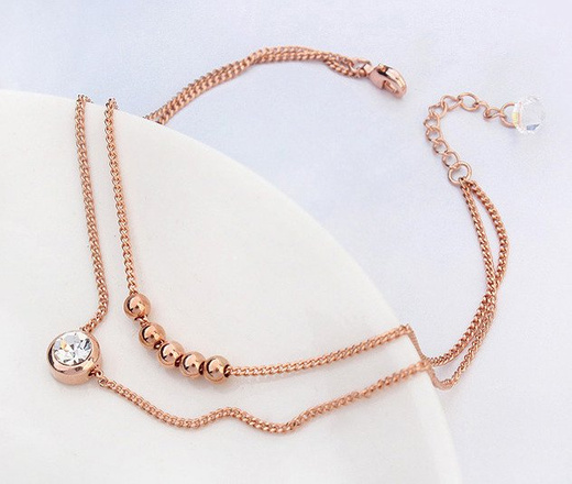 Br 599/641 BRANSOLETKA złota na stopę, podwójny łańcuszek , z cyrkonią i złotymi kuleczkami