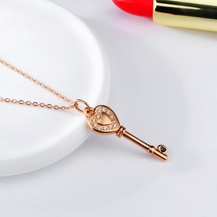 Nk 599/725 NASZYJNIK ze stali kluczyk różowe złoto