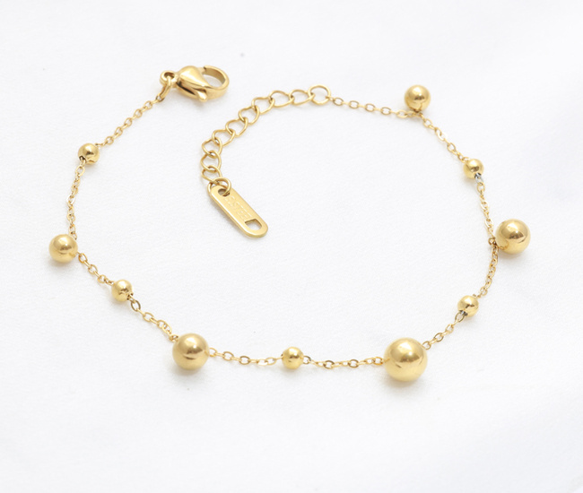 Bransoletka z kuleczkami, pozłacana stal szlachetna 1857/26