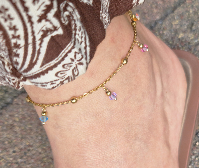 bransoletka pozłacana na stopę z kuleczkami i kryształkami Swarovski 1827/6