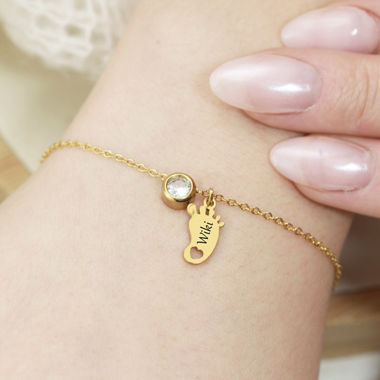 Bransoletka grawerowana z imieniem dziecka, stópka z cyrkonią 1764/1