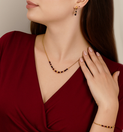 Elegancki burgundowy komplet złocony z granatem 1875/3