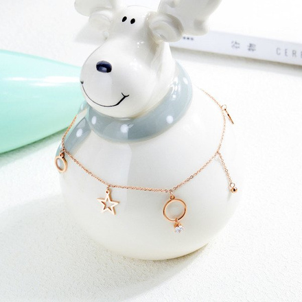 599/938 BRANSOLETKA stalowa na nogę połączone kółeczka, pierścionek, gwiazdka