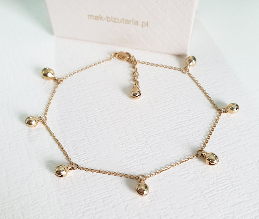 1071 bransoletka stalowa złota z kuleczkami dzwoniącymi na nogę