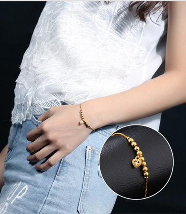 Br 599/605 BRANSOLETKA złocona ze złotymi kuleczkami i serduszkiem