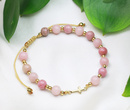 1737/14 różowa bransoletka różaniec złocona pastelowy róż