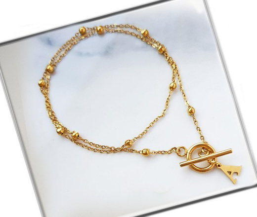 1232/14 naszyjnik złoty kulkowy z literką