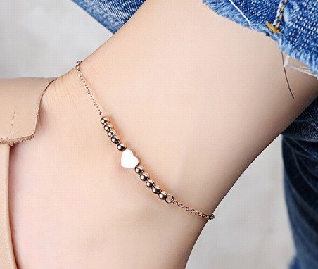 Br 599/835 BRANSOLETKA złota na stopę stalowa serce kuleczki