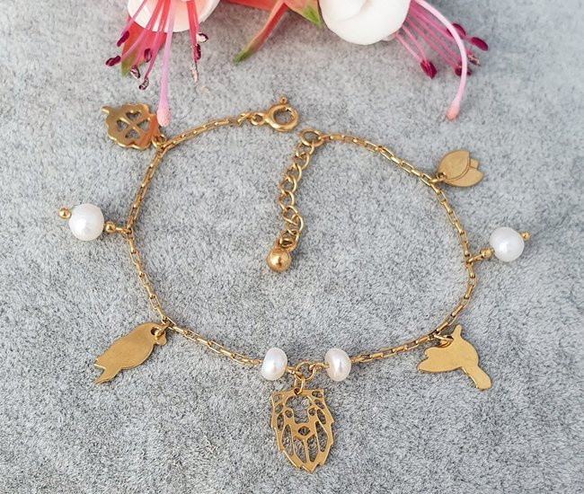 1199 bransoletka pozłacana grawerowana z zawieszkami srebro 925 perełki lew ptaszki koniczynka
