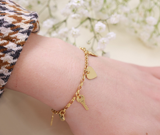 1557 bransoletka srebrna 925 pozłacana z zawieszkami serce skrzydło klucz