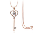 Nk 599/695 NASZYJNIK ze stali, klucz-serce wysadzane cyrkoniami, różowe złoto