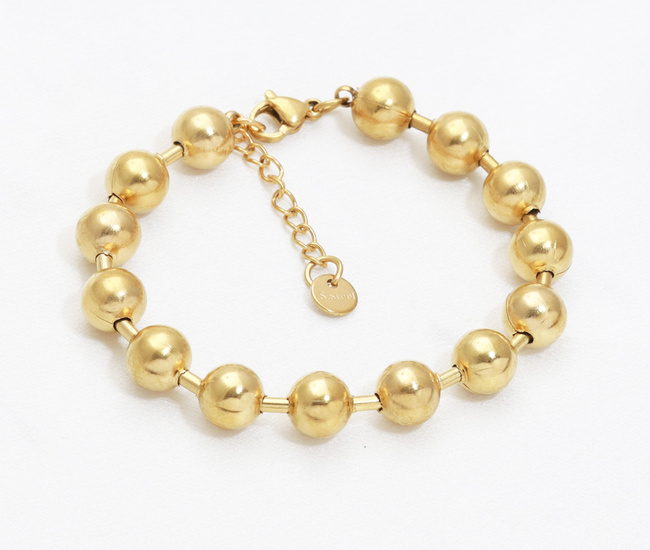 Masywna bransoletka z kuleczkami, pozłacana stal szlachetna 1857/29