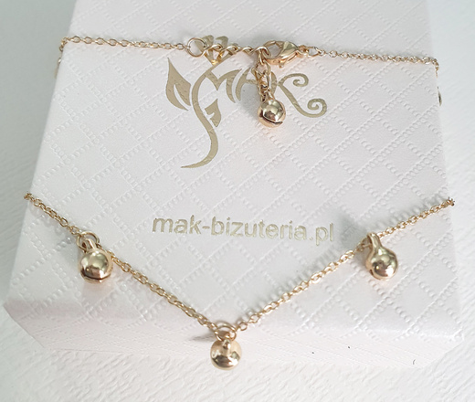 1071 bransoletka stalowa złota z kuleczkami dzwoniącymi na nogę