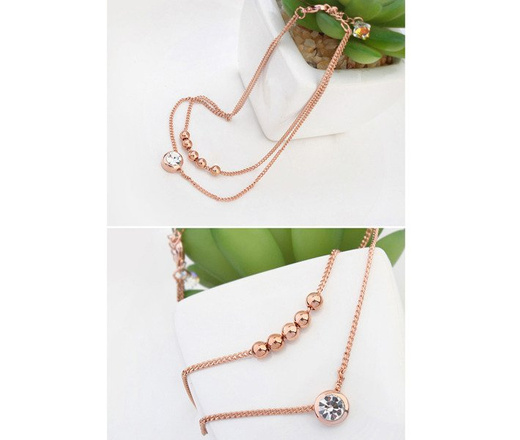 Br 599/641 BRANSOLETKA złota na stopę, podwójny łańcuszek , z cyrkonią i złotymi kuleczkami