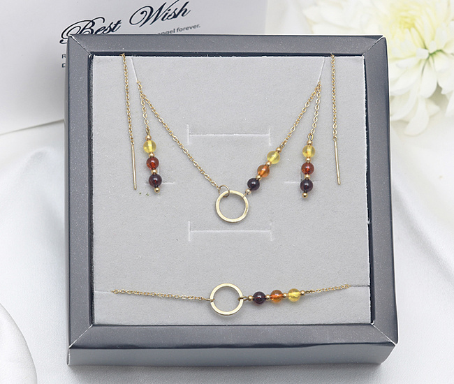 Elegancki bursztynowy komplet złocony  1875/7