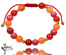 BR948 Bransoletka z pomarańczowo czerwonych jadeitów na sznurku