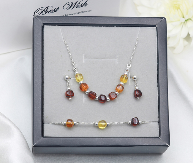 Elegancki bursztynowy komplet złocony  1875/10