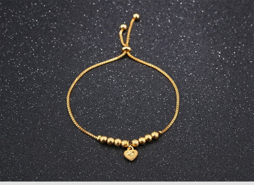 Br 599/605 BRANSOLETKA złocona ze złotymi kuleczkami i serduszkiem