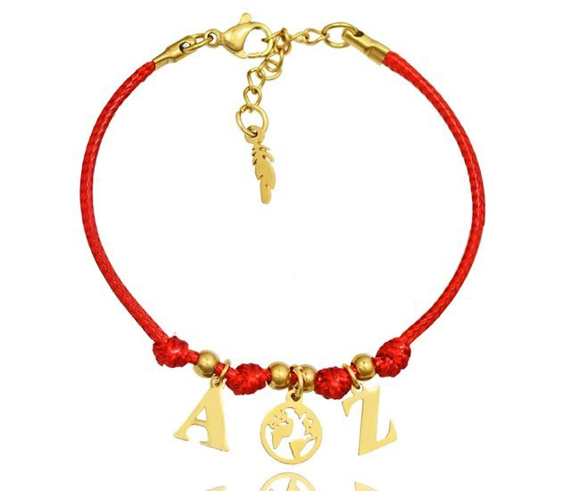 1232/9 bransoletka złota stalowa z kulą ziemską i inicjałami