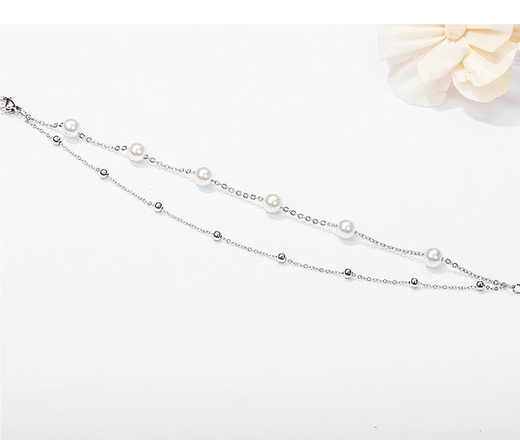 599/922 Bransoletka stalowa z perłami