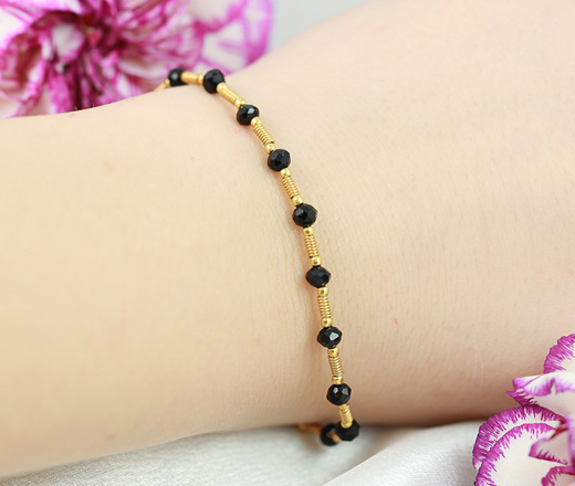 1571/3 bransoletka różaniec z czarnymi kryształkami pozłacana