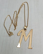1186 naszyjnik srebrny 925 pozłacany dowolna duża literka inicjał M