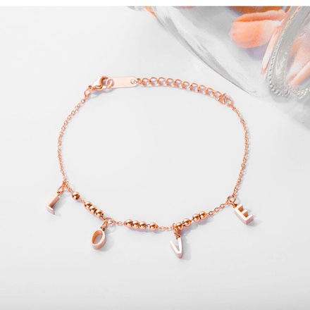 599/948 BRANSOLETKA stalowa złota z napisem LOVE